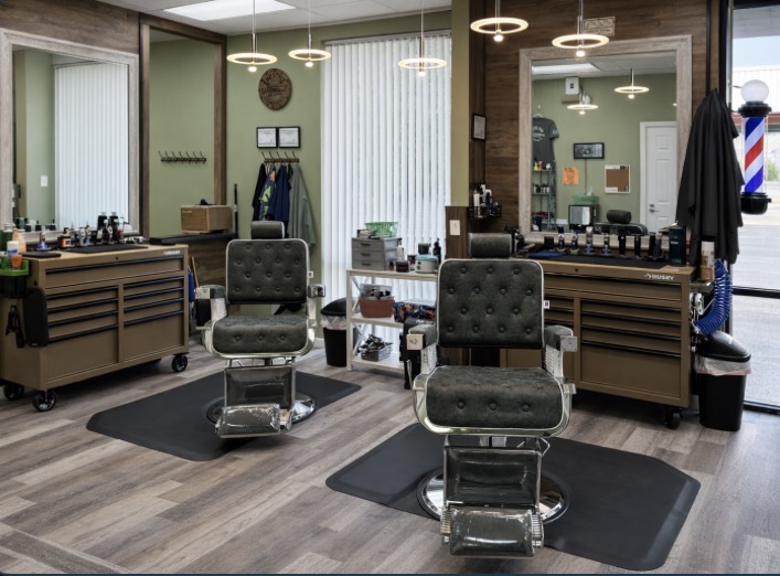 Inside Unc Style Barbershop and Suites in Jefferson City, TN — barber chairs, mirrors, and stations